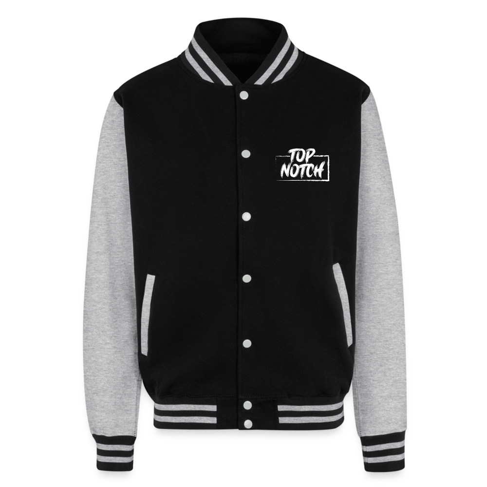 Step into style and comfort with the Just Hoods Heavyweight Letterman Jacket. This classic piece features a knitted collar, cuffs, and waistband adorned with stylish striped details that add a touch of sporty elegance. Secure your fit easily with press-stud closure buttons and enjoy modern convenience with a hidden earphone cord feed inside the pocket and discreet loops inside the collar. Perfect for the tech-savvy and fashion-forward individual, this jacket combines timeless design with functional features