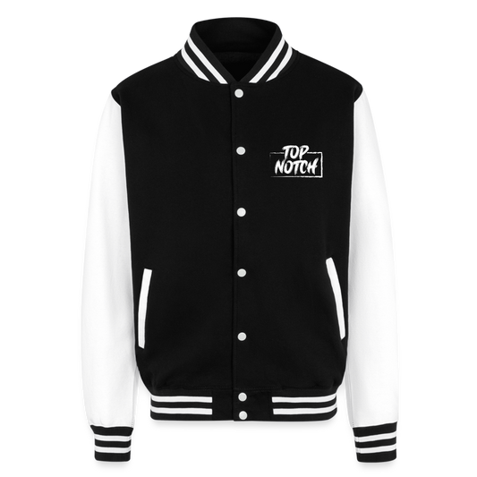 Step into style and comfort with the Just Hoods Heavyweight Letterman Jacket. This classic piece features a knitted collar, cuffs, and waistband adorned with stylish striped details that add a touch of sporty elegance. Secure your fit easily with press-stud closure buttons and enjoy modern convenience with a hidden earphone cord feed inside the pocket and discreet loops inside the collar. Perfect for the tech-savvy and fashion-forward individual, this jacket combines timeless design with functional features